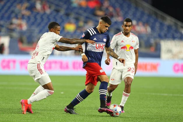 May 22, 2021; Foxborough, MA, USA; New England Revolution forward Gustavo Bou (7) and New York Red Bulls defender Kyle Duncan (6) in action during an MLS, Fussball Herren, USA match between New York Red Bulls Union and New England Revolution at Gillette Stadium. CSM Foxborough United States - ZUMAc04_ 20210522_zaf_c04_139 Copyright: xAnthonyxNesmithx