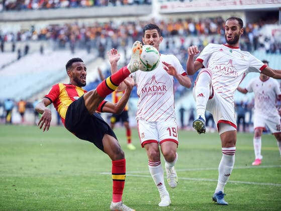 May 22, 2021, Tunis, Tunisia: Esperance player Hamdou El Houni and CR Belouizdad, Chamseddine Nessakh and Adel djarrar in action during the African Champions League quarter-final match between Esperance Sportive de Tunis (EST) and CR Belouizdad from Algeria at Rades stadiums. Tunis Tunisia - ZUMAs197 20210522_zaa_s197_241 Copyright: xJdidixWassimx