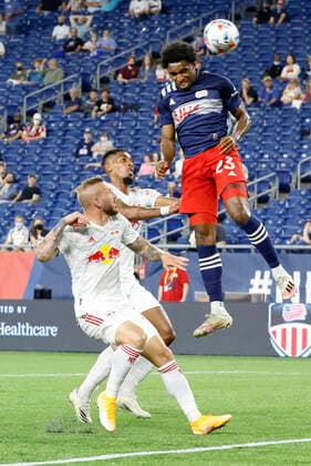 FOXBOROUGH, MA - MAY 22: New England Revolution defender Jon Bell (23) heads the ball on goal during a match between the New England Revolution and the New York Red Bulls on May 22, 2021, at Gillette Stadium in Foxborough, Massachusetts. (Photo by Fred Kfoury III Icon Sportswire) SOCCER: MAY 22 MLS, Fussball Herren, USA - New York Red Bulls at New England Revolution Icon482210522017