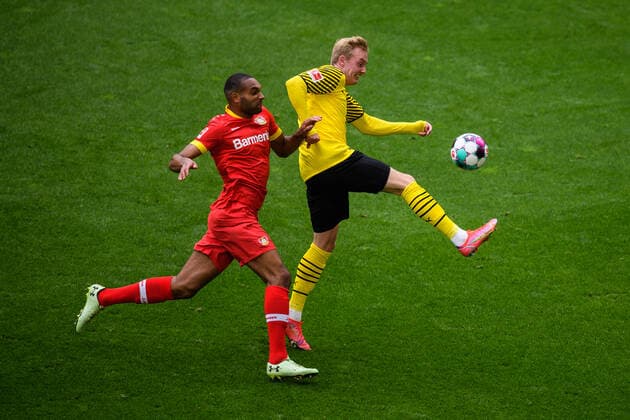 GES Fussball Borussia Dortmund - Bayer 04 Leverkusen, 22.05.2021 Zweikampf, Duell zwischen Jonathan Tah (Leverkusen) und Julian Brandt (BVB). GES Fussball 1. Bundesliga: Borussia Dortmund - Bayer 04 Leverkusen, 22.05.2021 Football Soccer: 1st german league: Dortmund vs Leverkusen, Dortmund, May 22, 2021 Foto:GES Edith Geuppert Pool via Norbert Schmidt DFL regulations prohibit any use of photographs as image sequences and or quasi-video. Dortmund NW Deutschland