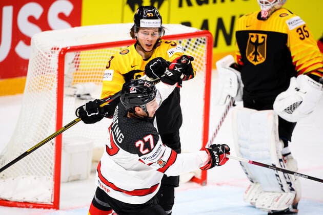 210524 Moritz Seider of Germany against Michael Bunting of Canada during the 2021 IIHF Ice hockey, Eishockey World Championship, WM, Weltmeisterschaft game between Germany and Canada on May 24, 2021 in Riga. Photo: Simon Hastegard BILDBYRAN kod SH SH0113 ishockey ice hockey ishockey-vm iihf ice hockey world championship germany tyskland canada kanada day 4 bbeng Copyright: SIMONxHASTEGARD BB210524SH048