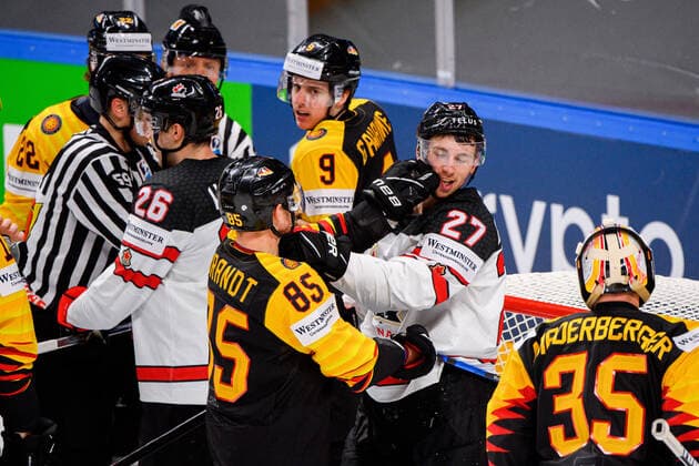 210524 Marcel Brandt of Germany and Michael Bunting of Canada during the 2021 IIHF Ice hockey, Eishockey World Championship, WM, Weltmeisterschaft game between Germany and Canada on May 24, 2021 in Riga. Photo: Simon Hastegard BILDBYRAN kod SH SH0113 ishockey ice hockey ishockey-vm iihf ice hockey world championship germany tyskland canada kanada day 4 bbeng Copyright: SIMONxHASTEGARD BB210524SH067