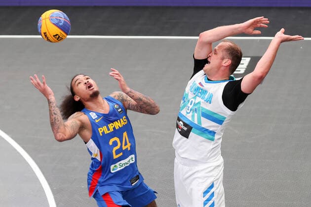 BASKETBALL - FIBA 3x3 Olympic Qualifying GRAZ,AUSTRIA,26.MAY.21 - BASKETBALL - FIBA 3x3 Olympic Qualifying, men, SLO vs PHI. Image shows Joshua Munzon (PHI) and Gasper Ovnik (SLO).  GEPAxpictures xChristianxWalgram