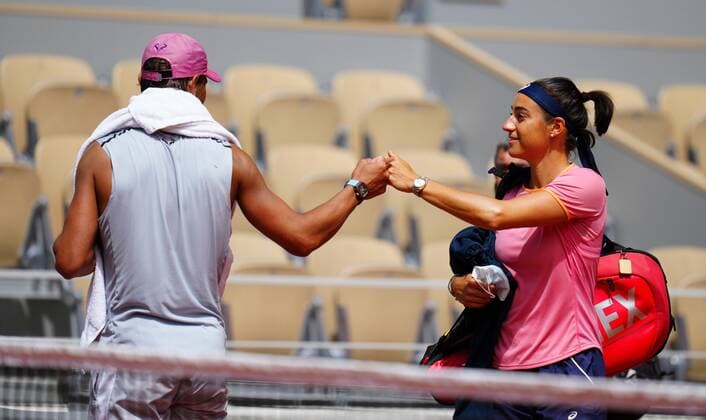 Mandatory Credit: Photo by Javier Garcia BPI Shutterstock (11976928cn) Rafael Nadal bumps fists with Caroline Garcia after his practice session French Open Tennis, Friday Previews, Roland Garros, Paris, France - 28 May 2021 French Open Tennis, Friday Previews, Roland Garros, Paris, France - 28 May 2021  Copyright: xJavierxGarcia BPI Shutterstockx 11976928cn