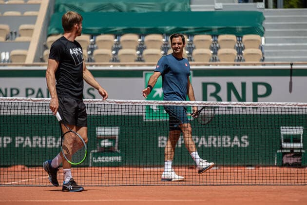 Roger Federer of Switzerland trains during a practice session with David Goffin of Belgium ahead of the French Open tennis tournament at Roland Garros in Paris, France, 28 May 2021. Roland Garros 2021 will run from 30 May to 13 June 2021.  Copyright: xAurelienxMorissardx