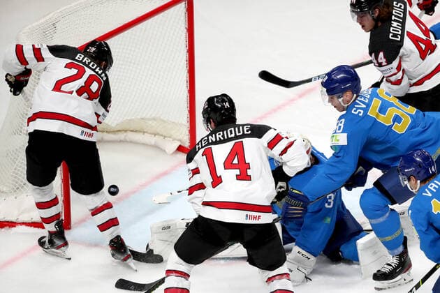 RIGA, LATVIA â€“ MAY 28, 2021: Kazakhstan s goaltender Andrei Shutov (C) concedes a goal in their 2021 IIHF Ice hockey, Eishockey World Championship, WM, Weltmeisterschaft Preliminary Round Group B match against Canada, at the Arena Riga. Natalia Fedosenko TASS  TS101DE3