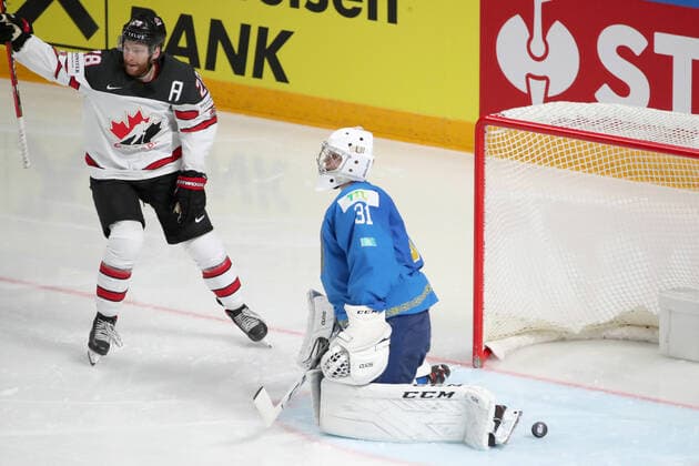 RIGA, LATVIA â€“ MAY 28, 2021: Canada s Connor Brown (L) reacts as Kazakhstan s goaltender Andrei Shutov concedes a goal in their 2021 IIHF Ice hockey, Eishockey World Championship, WM, Weltmeisterschaft Preliminary Round Group B match, at the Arena Riga. Natalia Fedosenko TASS  TS101E31
