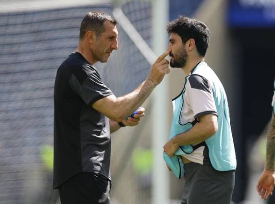Porto, Portugal, 28th May 2021. Ilkay Gundogan of Manchester City receives some treatment during their training session at the Estadio do Dragao, Porto. Picture credit should read: David Klein Sportimage EDITORIAL USE ONLY. No use with unauthorised audio, video, data, fixture lists, club league logos or live services. Online in-match use limited to 120 images, no video emulation. No use in betting, games or single club league player publications. SPI-1072-0021