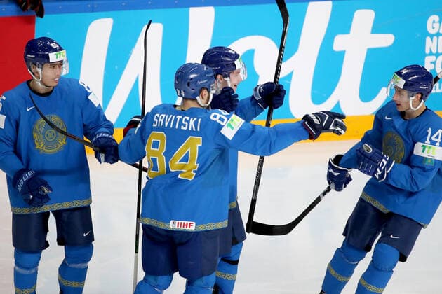 RIGA, LATVIA â€“ MAY 28, 2021: Kazakhstan s Samat Daniyar, Kirill Savitsky, Nikita Mikhailis, and Curtis Valk (L-R) celebrate scoring in their 2021 IIHF Ice hockey, Eishockey World Championship, WM, Weltmeisterschaft Preliminary Round Group B match against Canada, at the Arena Riga. Natalia Fedosenko TASS  TS101ECE
