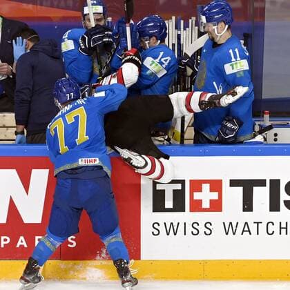 Sayan Daniyar (L) of Kazakhstan lifts Michael Bunting of Canada to the team box of Kazakhstan during the 2021 IIHF Men s Ice hockey, Eishockey World Championships preliminary round group B match between Kazakhstan and Canada in Riga, Latvia, on May 28, 2021. Riika, Riga Latvia LKFTJK20210528180939ILWN  Copyright: xJussixNukarix