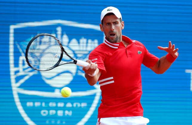 (210529) -- BELGRADE, May 29, 2021 -- Serbia s Novak Djokovic returns to Slovakia s Andrej Martin during their ATP, Tennis Herren 250 Belgrade Open semi-final singles tennis match in Belgrade, Serbia on May 28, 2021. (Photo by Xinhua) (SP)SERBIA-BELGRADE-TENNIS-DJOKOVIC-MARTIN PredragxMilosavljevic 