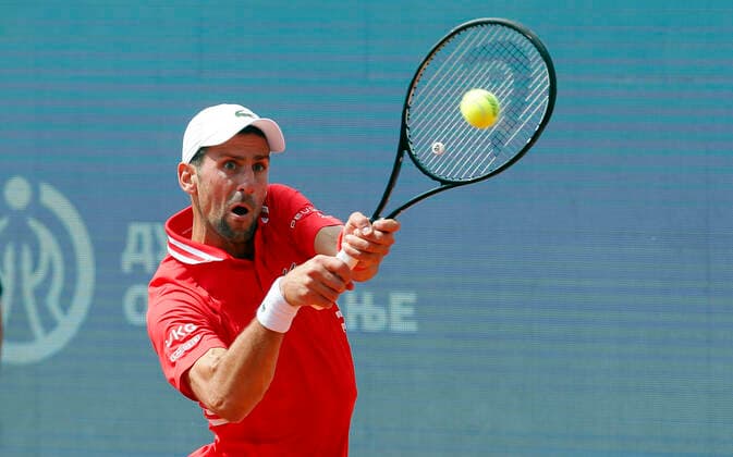 (210530) -- BELGRADE, May 30, 2021 -- Serbia s Novak Djokovic hits a return during the ATP, Tennis Herren 250 Belgrade Open singles final between Serbia s Novak Djokovic and Slovakia s Alex Molcan in Belgrade, Serbia on May 29, 2021. (Photo by Xinhua) (SP)SERBIA-BELGRADE-TENNIS-ATP BELGRADE OPEN-FINAL PredragxMilosavljevic 