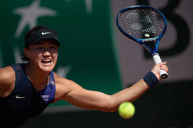 (210530) -- PARIS, May 30, 2021 -- Wang Xiyu hits a return during the women s singles first round match between Wang Xiyu of China and Danielle Collins of the United States of the French Open tennis tournament at Roland Garros in Paris, France, May 30, 2021. (Photo by Xinhua) (SP)FRANCE-PARIS-TENNIS-ROLAND GARROS-FRENCH OPEN-WOMEN S SINGLES AurelienxMorissard 
