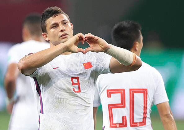 (210530) -- SUZHOU, May 30, 2021 -- Ai Kesen of China celebrates after scoring the team s fifth goal during a Group A match between China and Guam at FIFA World Cup, WM, Weltmeisterschaft, Fussball Qatar 2022 and AFC Asian Cup China 2023 Preliminary Joint Qualification in Suzhou, east China s Jiangsu Province, May 30, 2021. ) (SP)CHINA-JIANGSU-SUZHOU-SOCCER-2022 FIFA WORLD CUP QUALIFIER-CHN VS GUM(CN) CaoxCan 