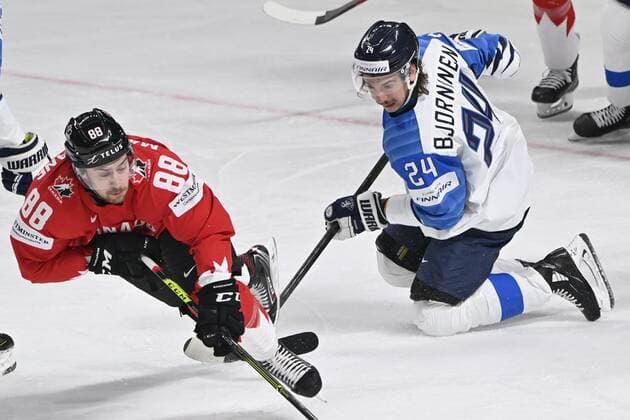 Hannes Björninen of Finland and Andrew Mangiapane of Canada vies during the 2021 IIHF Ice hockey, Eishockey World Championships preliminary round group B match Finland vs. Canada in Riga, Latvia, on June 01, 2021. Riika, Riga Latvia LKFTJK20210601123351VHNP  Copyright: xJussixNukarix