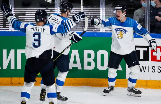 RIGA, LATVIA â€“ JUNE 1, 2021: Finland s Olli Maatta, Anton Lundell and Arttu Ruotsalainen (L-R) celebrate a goal scored against Canada in their 2021 IIHF World Championship, WM, Weltmeisterschaft Group B Ice hockey, Eishockey match at Arena Riga. Natalia Fedosenko TASS  TS10258B