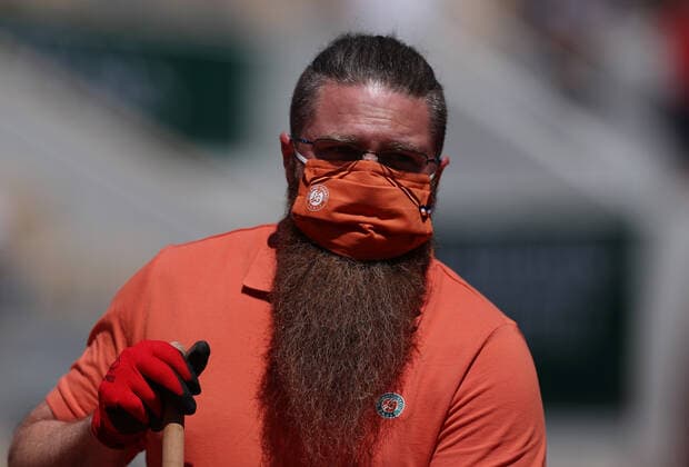 (210601) -- PARIS, June 1, 2021 -- A staff member is seen during the women s singles first round match between Elina Svitolina of Ukraine and Oceane Babel of France at the French Open tennis tournament at Roland Garros in Paris, France, June 1, 2021. ) (SP)FRANCE-PARIS-TENNIS-ROLAND GARROS-FRENCH OPEN-WOMEN S SINGLES GaoxJing 