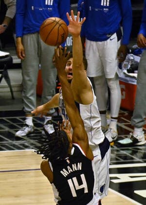 Los Angeles Clippers guard Terance Mann(14) scores on Dallas Mavericks forward Maxi Kleber (42) during the fourth quarter in Game 5 of their best-of-seven playoff series at Staples Center in Los Angeles on Wednesday, June 2, 2021. The Clippers lost to Dallas 105-100, their championship ambitions are hanging on for dear life trailing 3-2 in the series, with Game 6 coming on Friday in Dallas.  LAP2021060223 JIMxRUYMEN