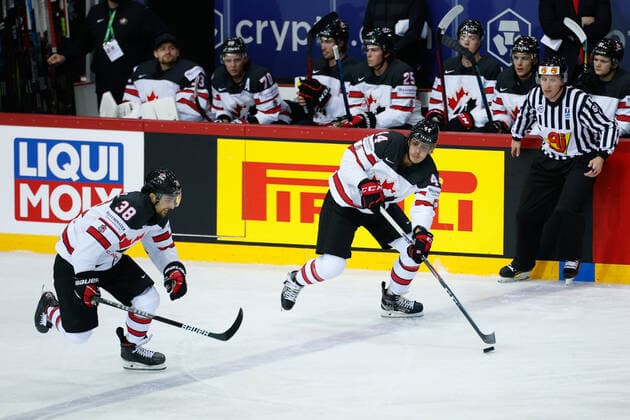 03.06.2021, Riga, Olympic Sports Centre, Quarterfinal: Russia - Canada (2021 IIHF Ice hockey, Eishockey World Championship, WM, Weltmeisterschaft , 44 Maxime Comtois (Canada) entering the zone with the puck. 38 Mario Ferraro (Canada) Riga Riga Latvia Copyright: xJustPictures.ch JarixPestelaccix