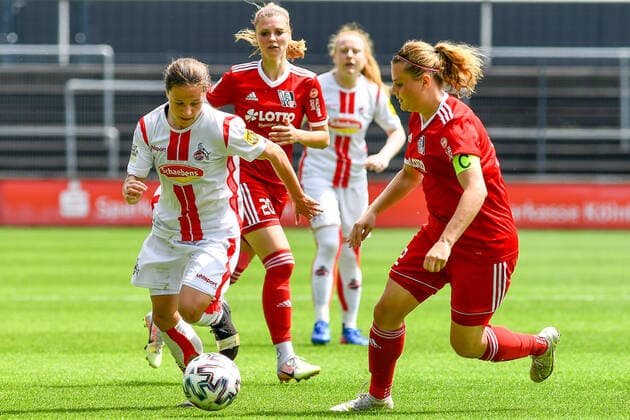 v.li.: Alicia-Sophie Gudorf (Köln, 12), Jasmin Mackert (FFC Niederkirchen, 12), Zweikampf, Duell, duel, tackle, tackling, Dynamik, Action, Aktion, 03.06.2021, Köln (Deutschland), Fussball, 2. Frauen-Bundesliga Süd, 1. FC Köln - 1. FFC Niederkirchen, DFB DFL REGULATIONS PROHIBIT ANY USE OF PHOTOGRAPHS AS IMAGE SEQUENCES AND OR QUASI-VIDEO.