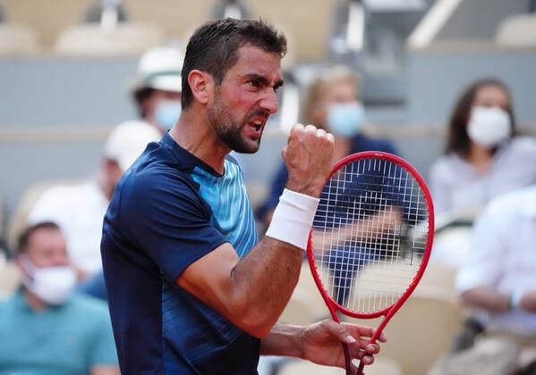 (210604) -- PARIS, June 4, 2021 -- Marin Cilic of Croatia celebrates during the men s singles second round match against Roger Federer of Switzerland at the French Open tennis tournament at Roland Garros in Paris, France, June 3, 2021. ) (SP)FRANCE-PARIS-TENNIS-ROLAND GARROS-FRENCH OPEN-MEN S SINGLES-DAY 5 GaoxJing 