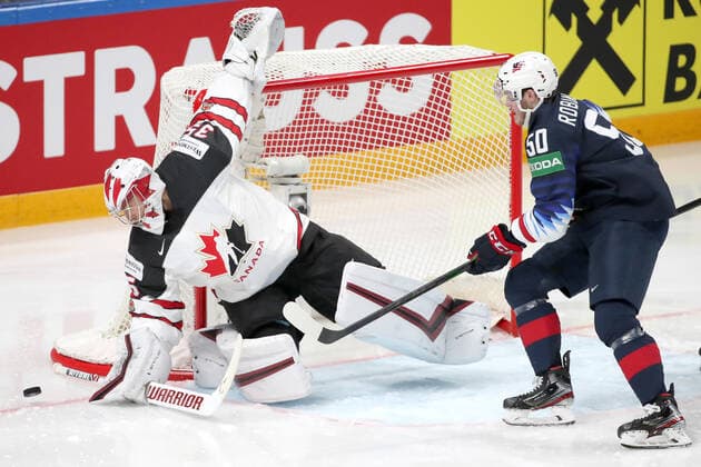 RIGA, LATVIA - JUNE 5, 2021: Goalie Darcy Kuemper of Canada and Eric Robinson of the USA are in action in their 2021 IIHF World Championship, WM, Weltmeisterschaft semifinal match at Arena Riga. Natalia Fedosenko TASS  TS103B9F