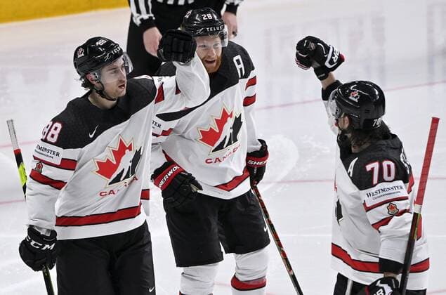 Eishockey, WM, Halbfinale, USA - Kanada From left, Andrew Mangiapane, Connor Brown and Troy Stecher of Canada calebrate 2-3 goal by Mangiapane during semi-final match USA vs Canada at the 2021 IIHF Ice hockey, Eishockey World Championships in Riga, Latvia on Saturday, May 5, 2021. Canada won 2-4. Riika, Riga Latvia LKFTJ20210605164136CXJK Copyright: xJussixNukarix