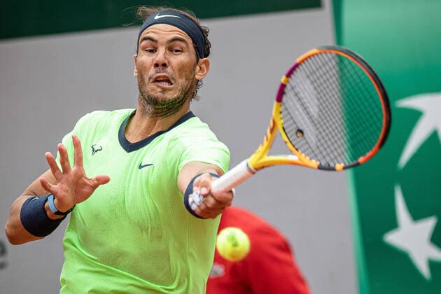 (210606) -- PARIS, June 6, 2021 -- Rafael Nadal returns the ball during the men s singles third round match between Rafael Nadal of Spain and Cameron Norrie of Britain at the French Open tennis tournament at Roland Garros in Paris, France, June 5, 2021. (Photo by Xinhua) (SP)FRANCE-PARIS-TENNIS-ROLAND GARROS-FRENCH OPEN-MEN S SINGLES AurelienxMorissard 