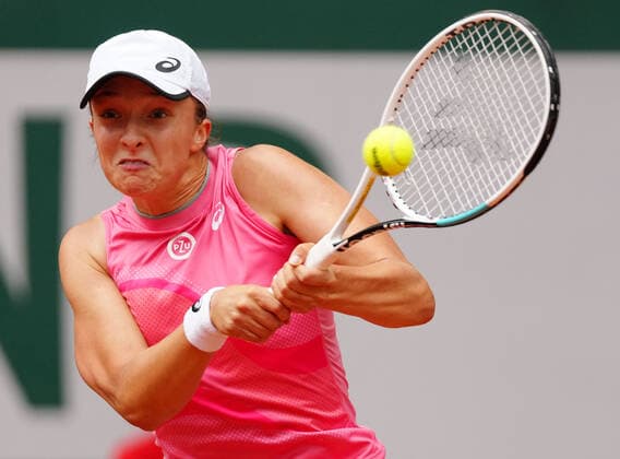 (210606) -- PARIS, June 6, 2021 -- Iga Swiatek of Poland returns the ball during the women s singles third round match between Iga Swiatek of Poland and Anett Kontaveit of Estonia at the French Open tennis tournament at Roland Garros in Paris, France, June 5, 2021. ) (SP)FRANCE-PARIS-TENNIS-ROLAND GARROS-FRENCH OPEN-WOMEN S SINGLES GaoxJing 