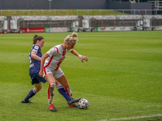 Cologne, Germany, June 6th 2021: Sharon Beck (10 1. FC Koeln) and Kathrin Schermuly (5 SG 99 Andernach) battle for the ball during the 2. Womens Bundesliga match between 1. FC Koeln and SG 99 Andernach at the Franz-Kremer-Stadium in Cologne, Germany. 2. Womens Bundesliga South - 1. FC K?ln v SG 99 Andernach 