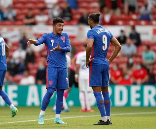 Middlesbrough, England, 6th June 2021. Jadon Sancho of England talks to Dominic Calvert-Lewin of England during the International Friendly, Länderspiel, Nationalmannschaft match at the Riverside Stadium, Middlesbrough. Picture credit should read: Darren Staples Sportimage EDITORIAL USE ONLY. No use with unauthorised audio, video, data, fixture lists, club league logos or live services. Online in-match use limited to 120 images, no video emulation. No use in betting, games or single club league player publications. SPI-1079-0032