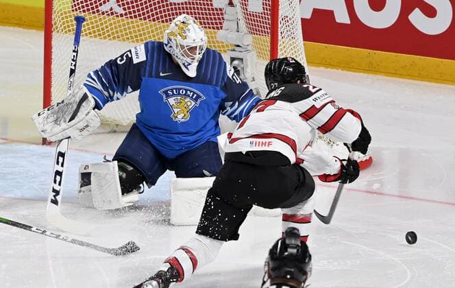 Goalkeeper Jussi Olkinuora of Finland and Michael Bunting of Canada in action during 2021 IIHF Ice hockey, Eishockey World Championships final Finland vs Canada in Riga, Latvia on Sunday, June 6, 2021. Riika, Riga Latvia LKFTJK20210606201611YQHG  Copyright: xJussixNukarix
