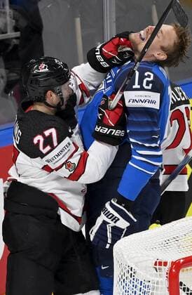 Michael Bunting of Canada hits Marko Anttila of Finland in the face during 2021 IIHF Ice hockey, Eishockey World Championships final Finland vs Canada in Riga, Latvia on Sunday, June 6, 2021. Riika, Riga Latvia LKFTJK20210606204003ICQX  Copyright: xJussixNukarix