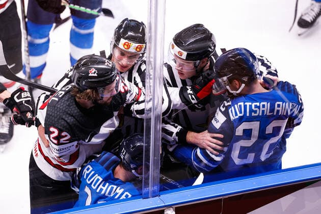 06.06.2021, Riga, Arena Riga, Final Finland - Canada (2021 IIHF Ice hockey, Eishockey World Championship, WM, Weltmeisterschaft , 22 Brandon Hagel (Canada) against 22 Arttu Ruotsalainen (Finland) and 13 Mikael Ruohomaa (Finland) separated by referees. Riga Riga Latvia Copyright: xJustPictures.ch JarixPestelaccix