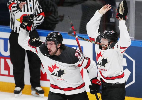 RIGA, LATVIA - JUNE 6, 2021: Canada s Nick Paul (L) and Connor Brown celebrate victory over Finland in their 2021 IIHF World Championship, WM, Weltmeisterschaft Final Ice hockey, Eishockey match at Arena Riga; Canada won 3-2 in overtime. Natalia Fedosenko TASS  TS103EAA