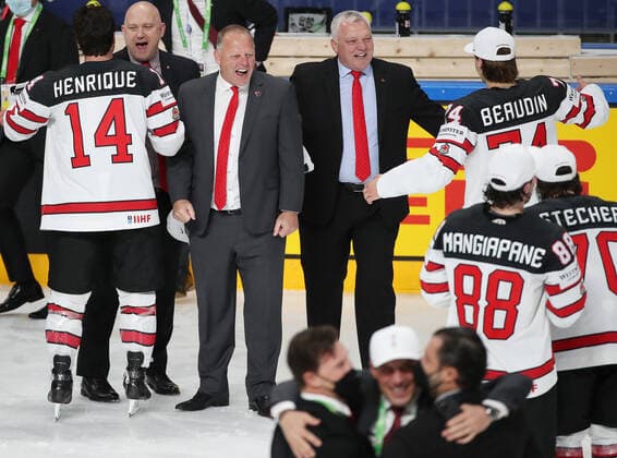 RIGA, LATVIA - JUNE 6, 2021: Canadian players and their head coach Gerard Gallant (3rd L) celebrate victory over Finland in their 2021 IIHF World Championship, WM, Weltmeisterschaft Final Ice hockey, Eishockey match at Arena Riga; Canada won 3-2 in overtime. Natalia Fedosenko TASS  TS103EC7