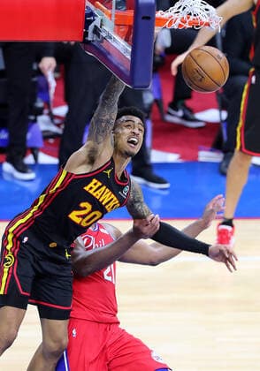June 6, 2021, Philadelphia, PA, USA: Atlanta Hawks forward John Collins slams for two and draws the foul from Philadelphia 76ers center Joel Embiid on a lob pass to the basket from Trae Young during the final seconds of a 128-124 Hawks victory in a NBA, Basketball Herren, USA second round Eastern Conference playoff basketball game on Sunday, Jun 6, 2021, in Philadelphia. Philadelphia USA - ZUMAm67_ 0120587478st Copyright: xCurtisxComptonx