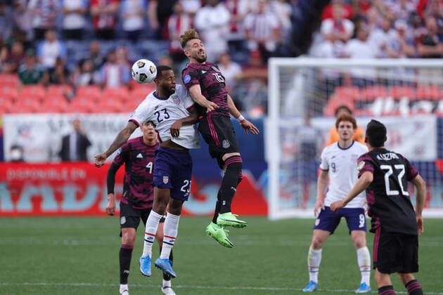 DENVER, CO - JUNE 06: United States midfielder Kellyn Acosta (23) battles with Mexico defender Hector Herrera (16) in action during the CONCACAF Nations League finals between Mexico and the United States on June 06, 2021, at Empower Field at Mile High in Denver, CO. (Photo by Robin Alam Icon Sportswire) SOCCER: JUN 06 Concacaf Nations League Final - Mexico v United States Icon164210606011