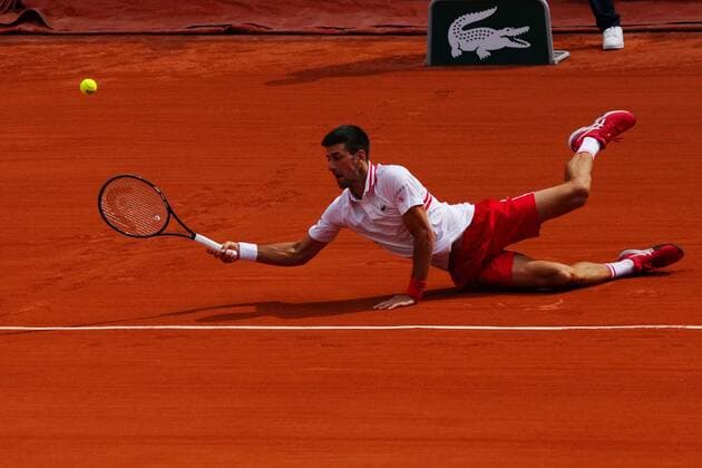 Mandatory Credit: Photo by Javier Garcia BPI Shutterstock (12019129gi) Novak Djokovic plays a forehand shot from the ground French Open Tennis, Day Nine, Roland Garros, Paris, France - 07 Jun 2021 French Open Tennis, Day Nine, Roland Garros, Paris, France - 07 Jun 2021  Copyright: xJavierxGarcia BPI Shutterstockx 12019129gi