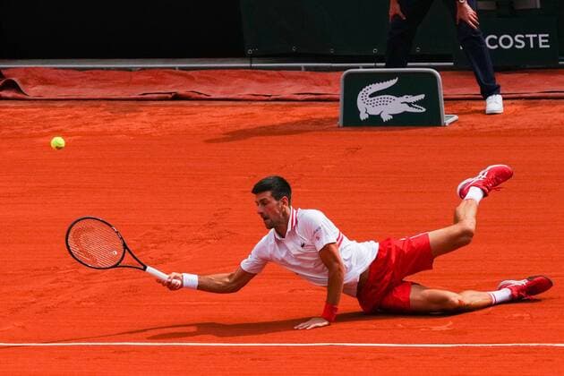 Mandatory Credit: Photo by Javier Garcia BPI Shutterstock (12019129hk) Novak Djokovic plays a forehand shot from the ground French Open Tennis, Day Nine, Roland Garros, Paris, France - 07 Jun 2021 French Open Tennis, Day Nine, Roland Garros, Paris, France - 07 Jun 2021  Copyright: xJavierxGarcia BPI Shutterstockx 12019129hk