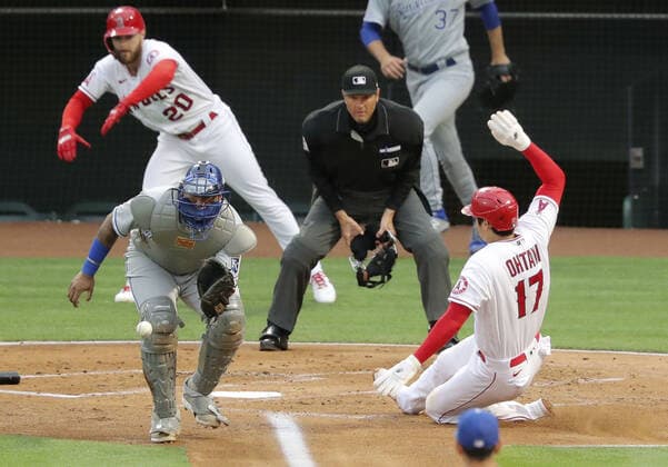 Baseball: Royals vs. Angels Shohei Ohtani (17) of the Los Angeles Angels scores on a single by Anthony Rendon in the first inning of a game against the Kansas City Royals on June 7, 2021, at Angel Stadium in Anaheim, California. 