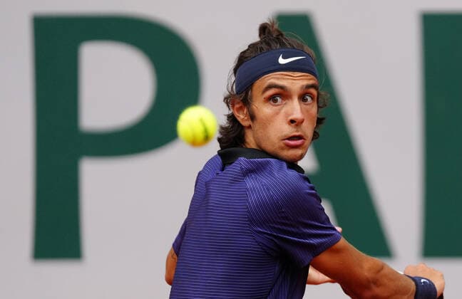 (210608) -- PARIS, June 8, 2021 -- Lorenzo Musetti of Italy hits a return during the men s singles fourth round match between Novak Djokovic of Serbia and Lorenzo Musetti of Italy at the French Open tennis tournament at Roland Garros in Paris, France, June 7, 2021. ) (SP)FRANCE-PARIS-TENNIS-ROLAND GARROS-FRENCH OPEN-DAY 9 GaoxJing 