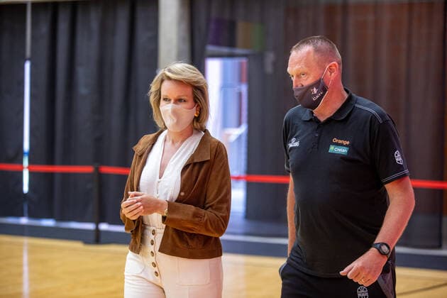 Queen Mathilde of Belgium and Belgian Cats head coach Philip Mestdagh pictured during a royal visit to the Belgian Cats, the Belgian national women s basketball team, in Kortrijk, Tuesday 08 June 2021. The Belgian Cats are participating in the Olympic Games, Olympische Spiele, Olympia, OS in Tokyo. After a round table discussion, the Queen will attend a training session and have a conversation with the basketball players at the Lange Munte sports campus in Kortrijk. KURTxDESPLENTER  x2809292x