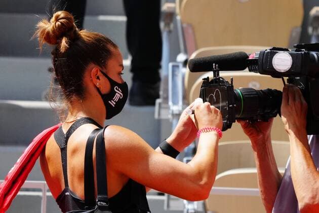 Mandatory Credit: Photo by Javier Garcia BPI Shutterstock (12046068he) Maria Sakkari signs a camera lens after winning French Open Tennis, Day Eleven, Roland Garros, Paris, France - 09 Jun 2021 French Open Tennis, Day Eleven, Roland Garros, Paris, France - 09 Jun 2021  Copyright: xJavierxGarcia BPI Shutterstockx 12046068he