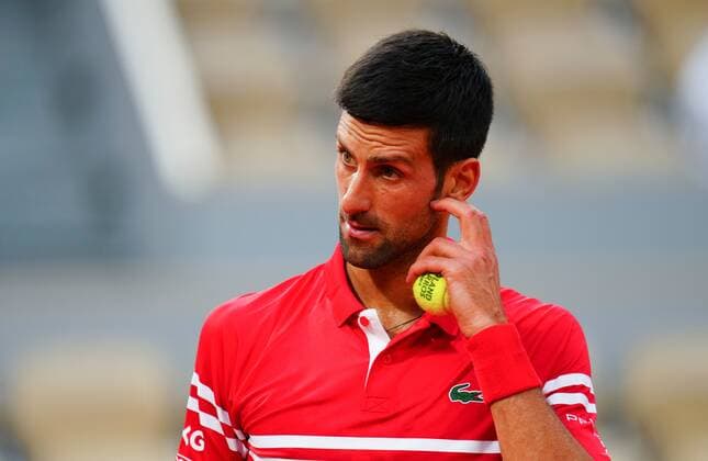 Mandatory Credit: Photo by Javier Garcia BPI Shutterstock (12046068ky) Novak Djokovic reacts to boos against him during his quarter final French Open Tennis, Day Eleven, Roland Garros, Paris, France - 09 Jun 2021 French Open Tennis, Day Eleven, Roland Garros, Paris, France - 09 Jun 2021  Copyright: xJavierxGarcia BPI Shutterstockx 12046068ky