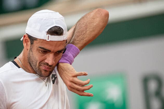 (210610) -- PARIS, June 10, 2021 -- Matteo Berrettini of Italy reacts during the men s singles quarterfinal against Novak Djokovic of Serbia at the French Open tennis tournament at Roland Garros in Paris, France, June 9, 2021. (Photo by Xinhua) (SP)FRANCE-PARIS-TENNIS-ROLAND GARROS-FRENCH OPEN-MEN S SINGLES-DAY 11 AurelienxMorissard 