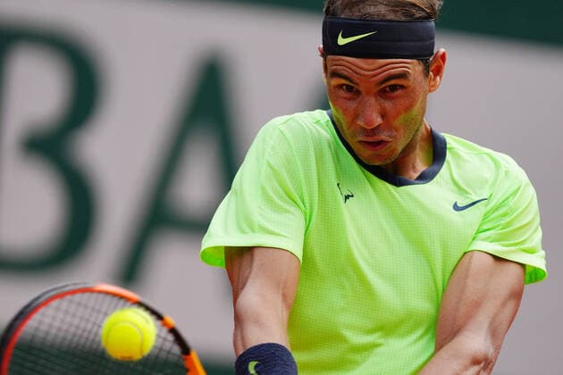 (210610) -- PARIS, June 10, 2021 -- Rafael Nadal of Spain hits a return during the men s singles quarterfinal against Diego Schwartzman of Argentina at the French Open tennis tournament at Roland Garros in Paris, France, June 9, 2021. ) (SP)FRANCE-PARIS-TENNIS-ROLAND GARROS-FRENCH OPEN-MEN S SINGLES-DAY 11 GaoxJing 