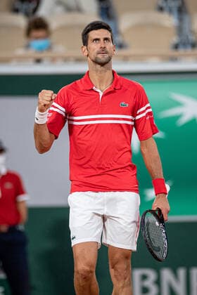 (210610) -- PARIS, June 10, 2021 -- Novak Djokovic of Serbia reacts during the men s singles quarterfinal against Matteo Berrettini of Italy at the French Open tennis tournament at Roland Garros in Paris, France, June 9, 2021. (Photo by Xinhua) (SP)FRANCE-PARIS-TENNIS-ROLAND GARROS-FRENCH OPEN-MEN S SINGLES-DAY 11 AurelienxMorissard 