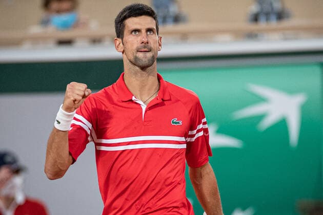 (210610) -- PARIS, June 10, 2021 -- Novak Djokovic of Serbia reacts during the men s singles quarterfinal against Matteo Berrettini of Italy at the French Open tennis tournament at Roland Garros in Paris, France, June 9, 2021. (Photo by Xinhua) (SP)FRANCE-PARIS-TENNIS-ROLAND GARROS-FRENCH OPEN-MEN S SINGLES-DAY 11 AurelienxMorissard 