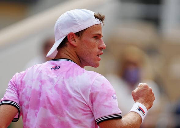 (210610) -- PARIS, June 10, 2021 -- Diego Schwartzman of Argentina reacts during the men s singles quarterfinal against Rafael Nadal of Spain at the French Open tennis tournament at Roland Garros in Paris, France, June 9, 2021. ) (SP)FRANCE-PARIS-TENNIS-ROLAND GARROS-FRENCH OPEN-MEN S SINGLES-DAY 11 GaoxJing 